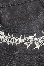 Embroidered Flared Raw Jeans