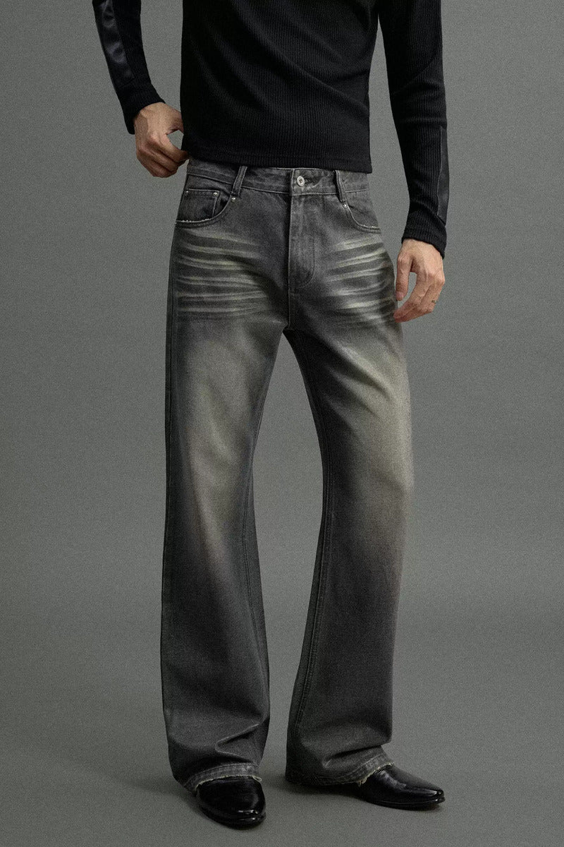 Faded Waxed Flared Jeans